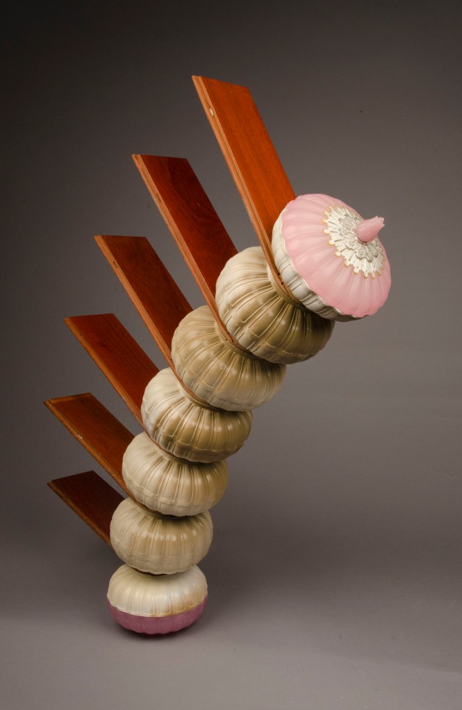 Plastic candy dish, plaster, tongue and groove flooring, steel; 30" x 29" x 5"